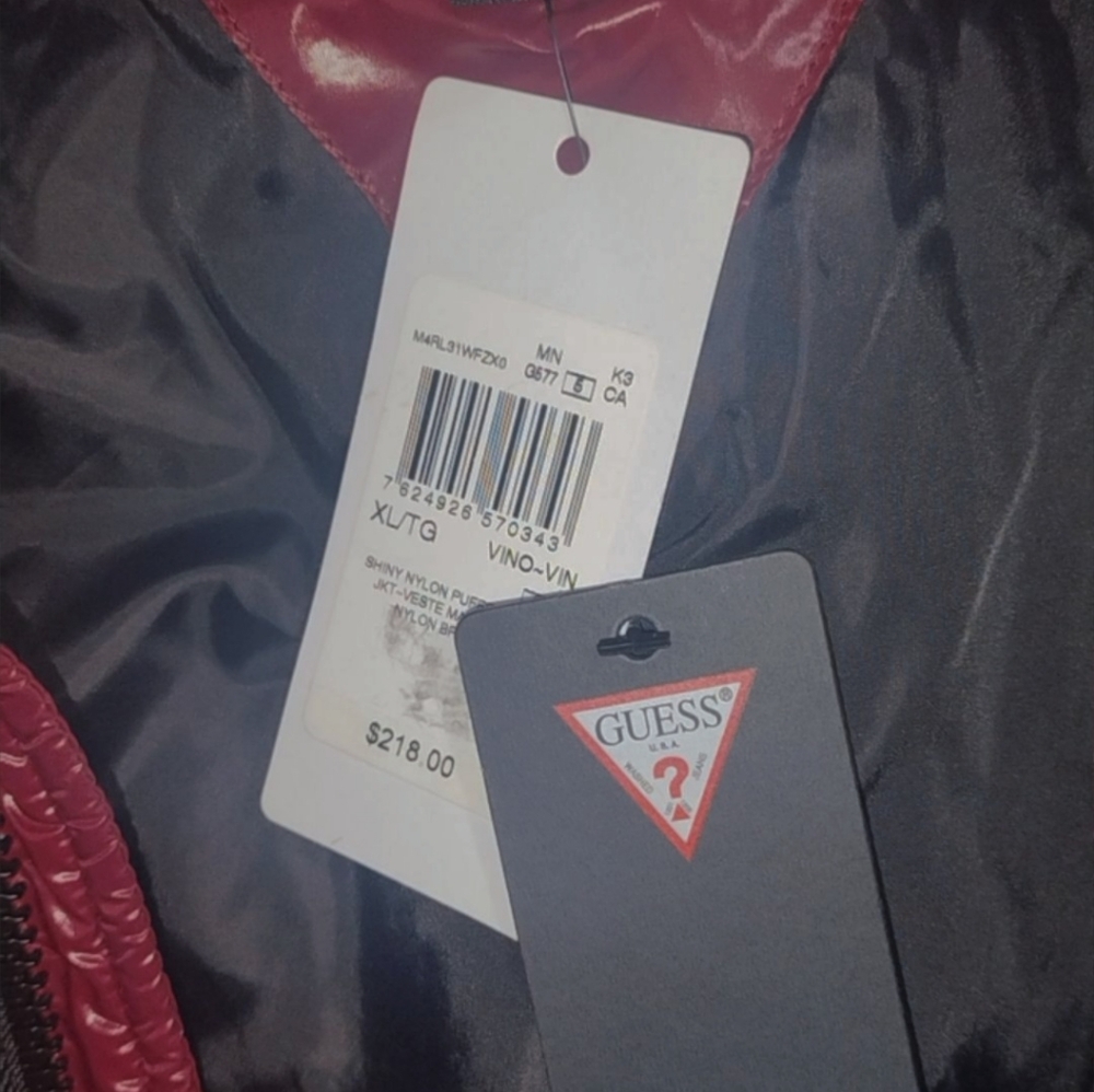 NWT Women's Guess Red puffer jacket with a hood.  Zipper closure.  Two pockets